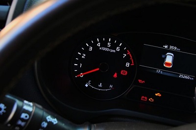 car dashboard with warning lights